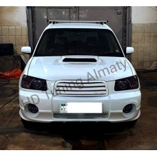 Grille Tommy Kaira