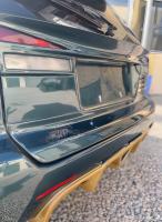 Mid spoiler rear door 